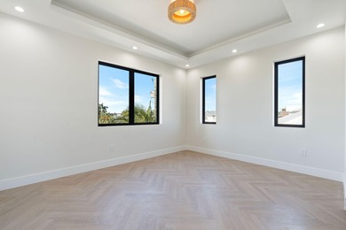 Brand new 2025 waterfront masterpiece. 5 bed, 4 bath, 3,580 sf on Key Colony Beach Golf Course in Florida - for sale on GolfHomes.com, golf home, golf lot