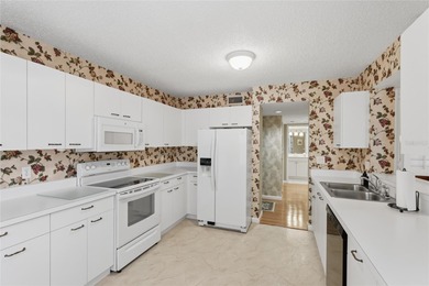 Welcome to this Pinebrook Condominium end unit offering on Pinebrook/Ironwood Golf Course in Florida - for sale on GolfHomes.com, golf home, golf lot