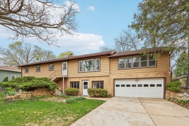 This well kept Mid Century gem is a terrific opportunity for on Odana Hills Golf Course in Wisconsin - for sale on GolfHomes.com, golf home, golf lot