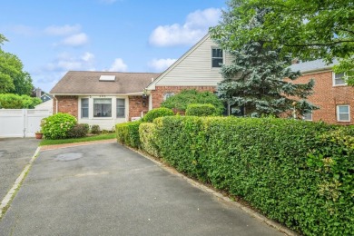 Welcome to this Custom Built, Expanded California Ranch on on Middle Bay Country Club in New York - for sale on GolfHomes.com, golf home, golf lot