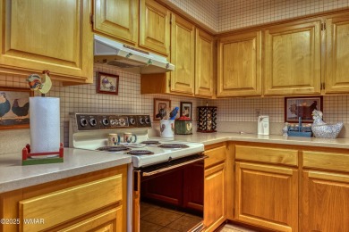 Stunning mountain retreat! This spacious patio home features on Pinetop Lakes Golf and Country Club in Arizona - for sale on GolfHomes.com, golf home, golf lot