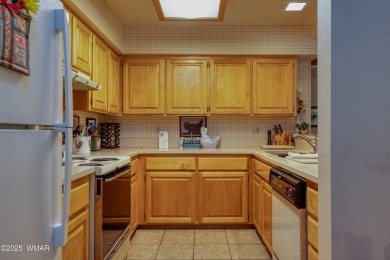 Stunning mountain retreat! This spacious patio home features on Pinetop Lakes Golf and Country Club in Arizona - for sale on GolfHomes.com, golf home, golf lot