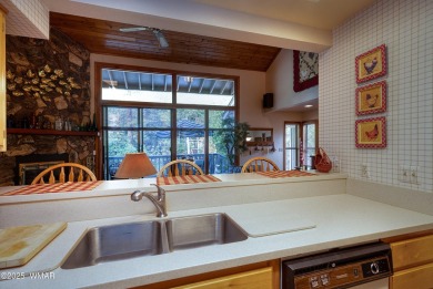 Stunning mountain retreat! This spacious patio home features on Pinetop Lakes Golf and Country Club in Arizona - for sale on GolfHomes.com, golf home, golf lot