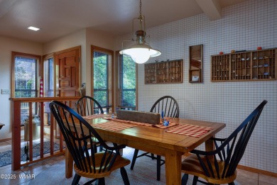 Stunning mountain retreat! This spacious patio home features on Pinetop Lakes Golf and Country Club in Arizona - for sale on GolfHomes.com, golf home, golf lot