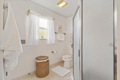 This beautiful Wisteria Style Designer Home in the Village of on Glenview Championship Golf and Country Club in Florida - for sale on GolfHomes.com, golf home, golf lot