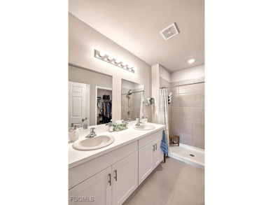 This 2023-built 2-bedroom + den, 2-bathroom attached villa is on Herons Glen Golf and Country Club in Florida - for sale on GolfHomes.com, golf home, golf lot