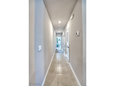 This 2023-built 2-bedroom + den, 2-bathroom attached villa is on Herons Glen Golf and Country Club in Florida - for sale on GolfHomes.com, golf home, golf lot