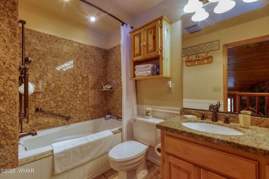 Stunning mountain retreat! This spacious patio home features on Pinetop Lakes Golf and Country Club in Arizona - for sale on GolfHomes.com, golf home, golf lot