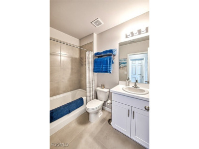 This 2023-built 2-bedroom + den, 2-bathroom attached villa is on Herons Glen Golf and Country Club in Florida - for sale on GolfHomes.com, golf home, golf lot