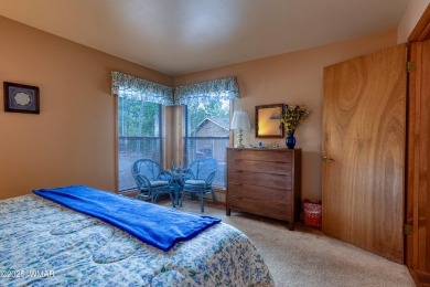 Stunning mountain retreat! This spacious patio home features on Pinetop Lakes Golf and Country Club in Arizona - for sale on GolfHomes.com, golf home, golf lot