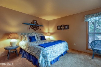 Stunning mountain retreat! This spacious patio home features on Pinetop Lakes Golf and Country Club in Arizona - for sale on GolfHomes.com, golf home, golf lot