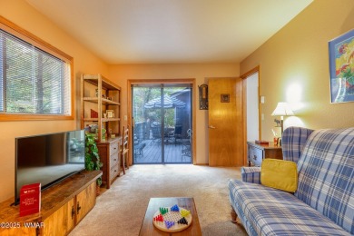 Stunning mountain retreat! This spacious patio home features on Pinetop Lakes Golf and Country Club in Arizona - for sale on GolfHomes.com, golf home, golf lot