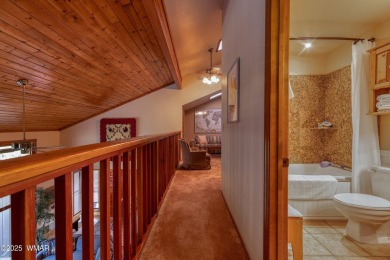 Stunning mountain retreat! This spacious patio home features on Pinetop Lakes Golf and Country Club in Arizona - for sale on GolfHomes.com, golf home, golf lot