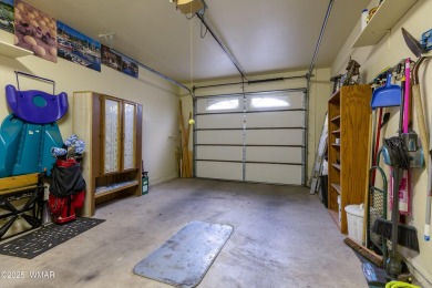 Stunning mountain retreat! This spacious patio home features on Pinetop Lakes Golf and Country Club in Arizona - for sale on GolfHomes.com, golf home, golf lot