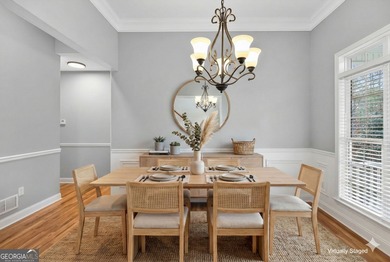 Tucked inside the gated, resort-style community of Fairfield on Fairfield Plantation Golf and Country Club in Georgia - for sale on GolfHomes.com, golf home, golf lot