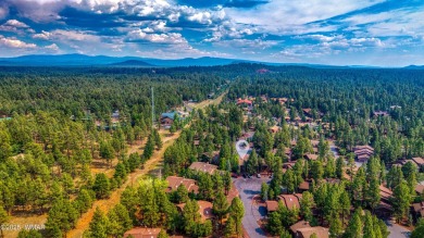 Stunning mountain retreat! This spacious patio home features on Pinetop Lakes Golf and Country Club in Arizona - for sale on GolfHomes.com, golf home, golf lot