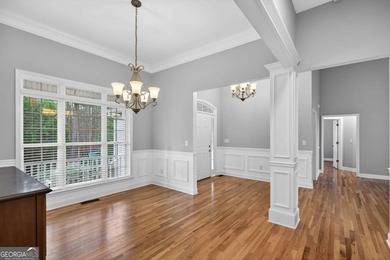 Tucked inside the gated, resort-style community of Fairfield on Fairfield Plantation Golf and Country Club in Georgia - for sale on GolfHomes.com, golf home, golf lot