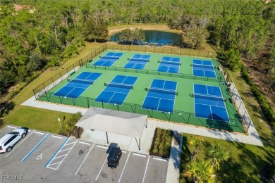 This 2023-built 2-bedroom + den, 2-bathroom attached villa is on Herons Glen Golf and Country Club in Florida - for sale on GolfHomes.com, golf home, golf lot