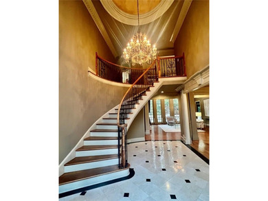 Magnificent four sides brick home with sweeping golf course on TPC At Sugarloaf Golf Club in Georgia - for sale on GolfHomes.com, golf home, golf lot