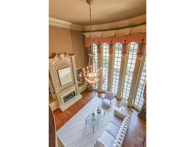 Magnificent four sides brick home with sweeping golf course on TPC At Sugarloaf Golf Club in Georgia - for sale on GolfHomes.com, golf home, golf lot