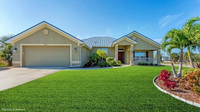 Welcome to this beautifully maintained 4-bedroom, 3-bath home on Rotonda Golf and Country Club - Long Marsh  in Florida - for sale on GolfHomes.com, golf home, golf lot