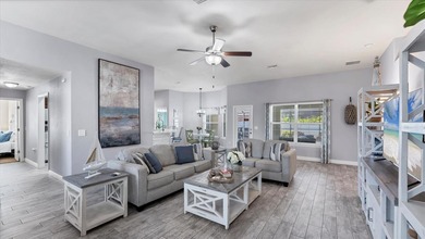 Welcome to this beautifully maintained 4-bedroom, 3-bath home on Rotonda Golf and Country Club - Long Marsh  in Florida - for sale on GolfHomes.com, golf home, golf lot