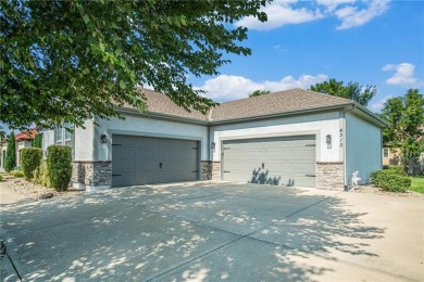 With gorgeous curb appeal and sweeping lake views from nearly on Falcon Lakes Golf Course in Kansas - for sale on GolfHomes.com, golf home, golf lot