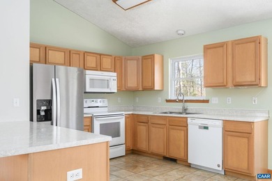 Nature-inspired charm meets effortless one-level living in on Lake Monticello Golf Course in Virginia - for sale on GolfHomes.com, golf home, golf lot