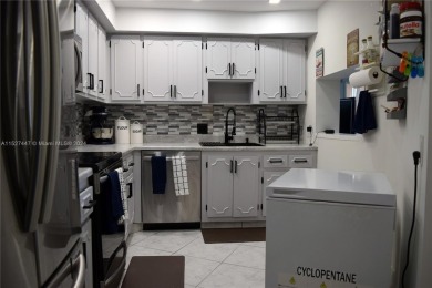 Step into luxury with this exquisite 1-bedroom, 1.5-bathroom on Palm-Aire Country Club and Resort - Palms in Florida - for sale on GolfHomes.com, golf home, golf lot