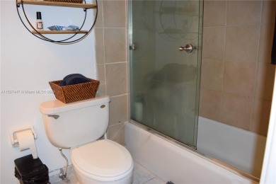 Step into luxury with this exquisite 1-bedroom, 1.5-bathroom on Palm-Aire Country Club and Resort - Palms in Florida - for sale on GolfHomes.com, golf home, golf lot