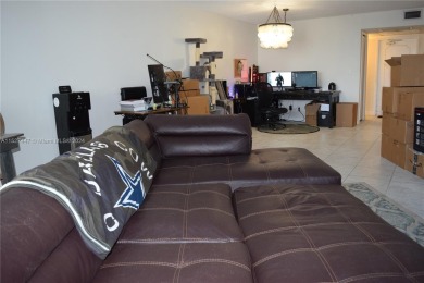 Step into luxury with this exquisite 1-bedroom, 1.5-bathroom on Palm-Aire Country Club and Resort - Palms in Florida - for sale on GolfHomes.com, golf home, golf lot