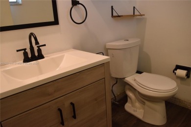 Step into luxury with this exquisite 1-bedroom, 1.5-bathroom on Palm-Aire Country Club and Resort - Palms in Florida - for sale on GolfHomes.com, golf home, golf lot
