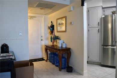 Step into luxury with this exquisite 1-bedroom, 1.5-bathroom on Palm-Aire Country Club and Resort - Palms in Florida - for sale on GolfHomes.com, golf home, golf lot