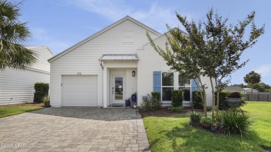 This like-new beach retreat in the quiet gated community of on Camp Creek Golf Course in Florida - for sale on GolfHomes.com, golf home, golf lot