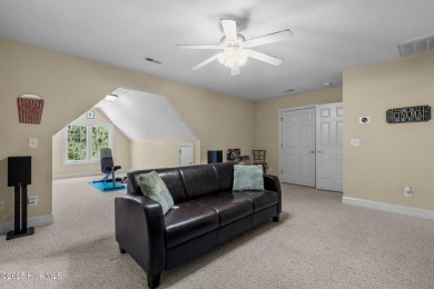 Beautiful all-brick home in the gated Pinewild community on Pinewild Country Club of Pinehurst in North Carolina - for sale on GolfHomes.com, golf home, golf lot