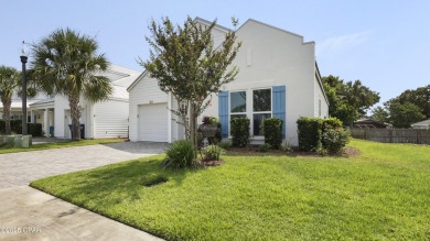 This like-new beach retreat in the quiet gated community of on Camp Creek Golf Course in Florida - for sale on GolfHomes.com, golf home, golf lot