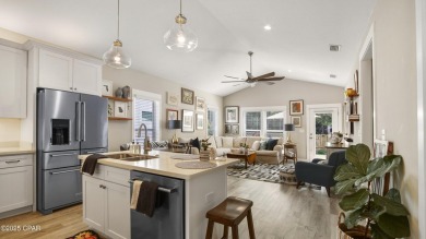 This like-new beach retreat in the quiet gated community of on Camp Creek Golf Course in Florida - for sale on GolfHomes.com, golf home, golf lot