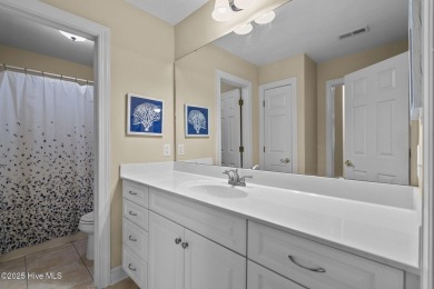 Beautiful all-brick home in the gated Pinewild community on Pinewild Country Club of Pinehurst in North Carolina - for sale on GolfHomes.com, golf home, golf lot