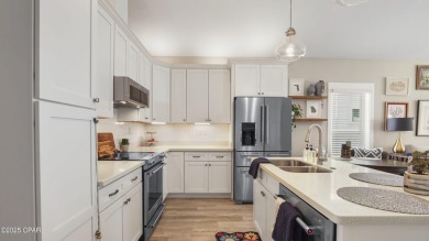 This like-new beach retreat in the quiet gated community of on Camp Creek Golf Course in Florida - for sale on GolfHomes.com, golf home, golf lot