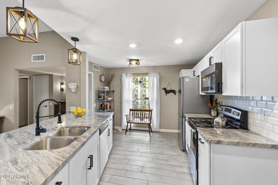 Stunning mid-century modern farmhouse with true Sun City charm! on Sun City-Willow Creek / Willow Brook  in Arizona - for sale on GolfHomes.com, golf home, golf lot