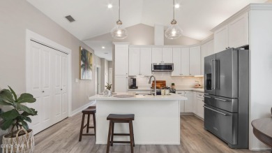 This like-new beach retreat in the quiet gated community of on Camp Creek Golf Course in Florida - for sale on GolfHomes.com, golf home, golf lot