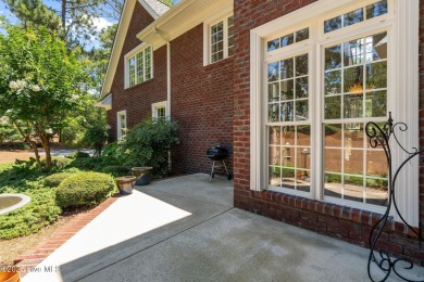 Beautiful all-brick home in the gated Pinewild community on Pinewild Country Club of Pinehurst in North Carolina - for sale on GolfHomes.com, golf home, golf lot