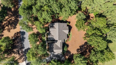 Beautiful all-brick home in the gated Pinewild community on Pinewild Country Club of Pinehurst in North Carolina - for sale on GolfHomes.com, golf home, golf lot