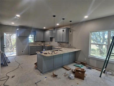 This home offers a comfortable and modern living space with a on Hideout Golf Club and Resort  in Texas - for sale on GolfHomes.com, golf home, golf lot
