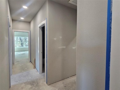 This home offers a comfortable and modern living space with a on Hideout Golf Club and Resort  in Texas - for sale on GolfHomes.com, golf home, golf lot