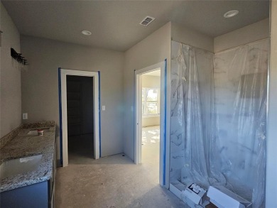 This home offers a comfortable and modern living space with a on Hideout Golf Club and Resort  in Texas - for sale on GolfHomes.com, golf home, golf lot