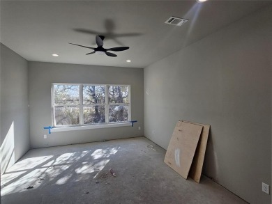 This home offers a comfortable and modern living space with a on Hideout Golf Club and Resort  in Texas - for sale on GolfHomes.com, golf home, golf lot