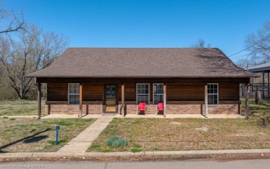 Looking for some extra space without leaving town? This property on Cherokee Creek Golf Club in Arkansas - for sale on GolfHomes.com, golf home, golf lot