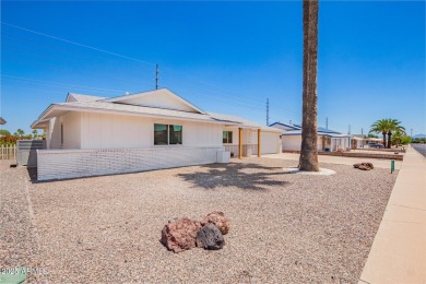 Finally-a home that lives as effortlessly as you've been on Sun City Country Club in Arizona - for sale on GolfHomes.com, golf home, golf lot