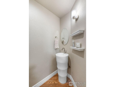 Enjoy the ease of main-floor AND upper-level ensuite living in on Coal Creek Golf Course in Colorado - for sale on GolfHomes.com, golf home, golf lot